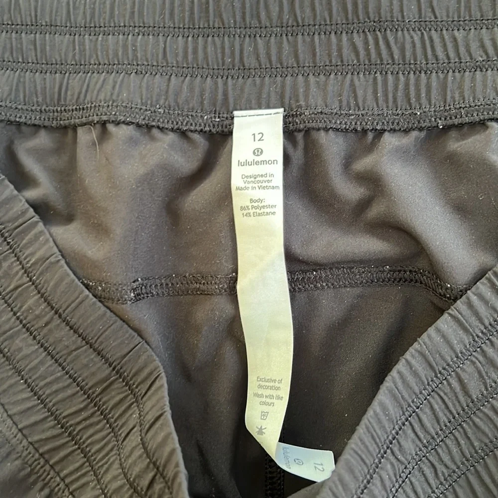 Lululemon Athletica SZ 12, black cropped wide leg pants .